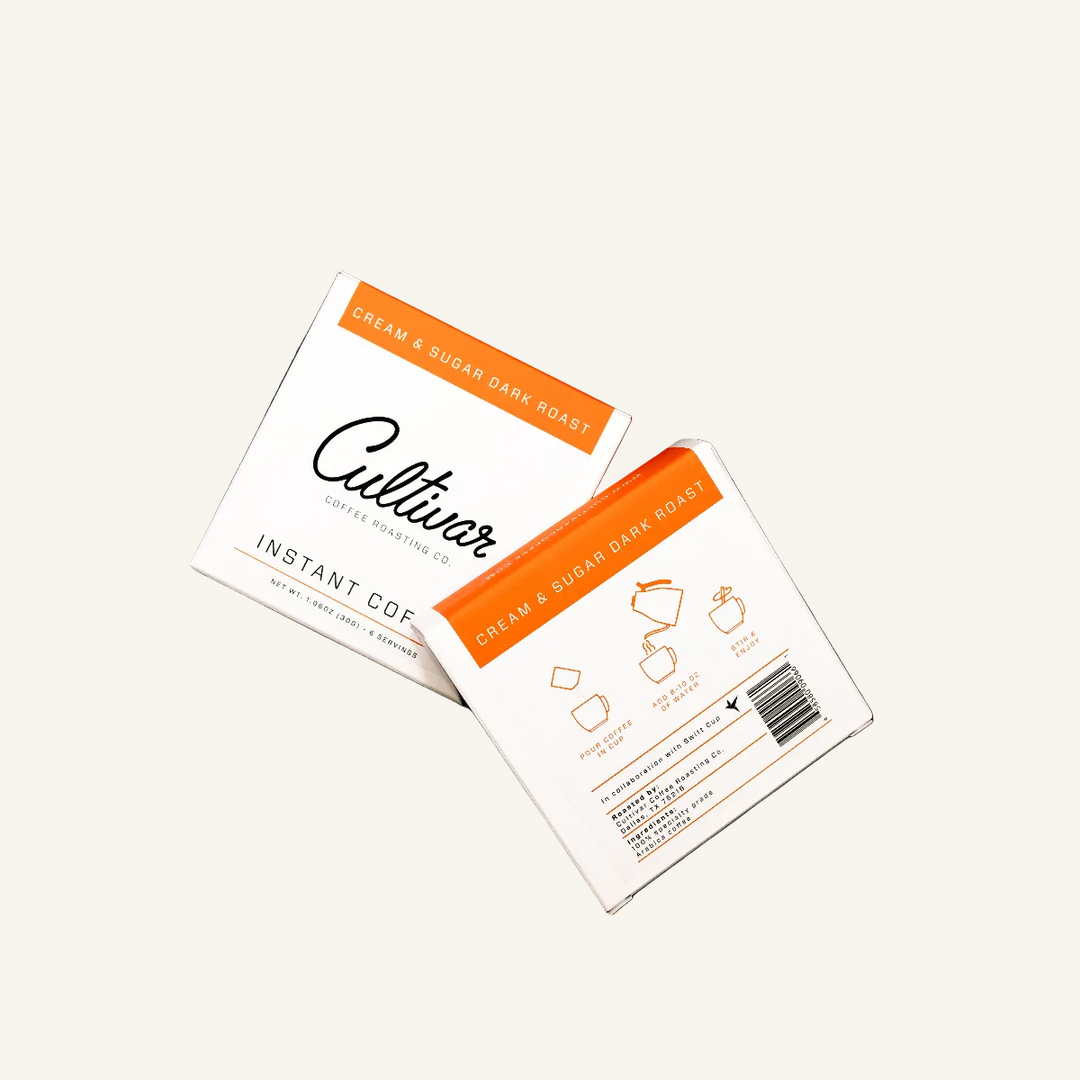 Retail bag of Cultivar Coffee Roasting Co.'s Cream & Sugar Dark Roast Instant Coffee freshly roasted coffee beans